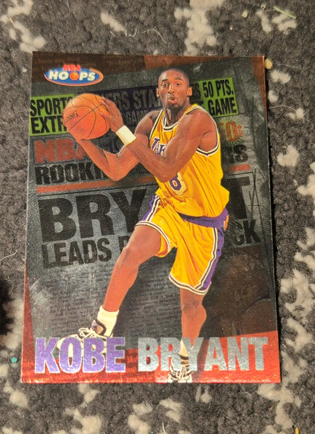 1997-98 NBA Hoops Kobe Bryant Rookie Headliner #3/10 - Front