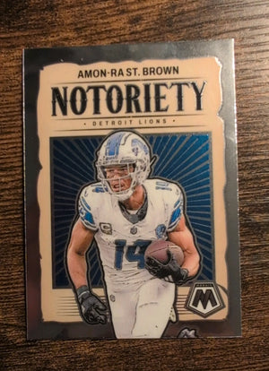 2024 Panini Mosaic Amon-Ra St. Brown Notoriety #12
